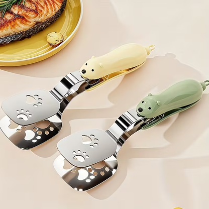 Stainless steel fish spatula, which can be used as both a tong and a spatula.