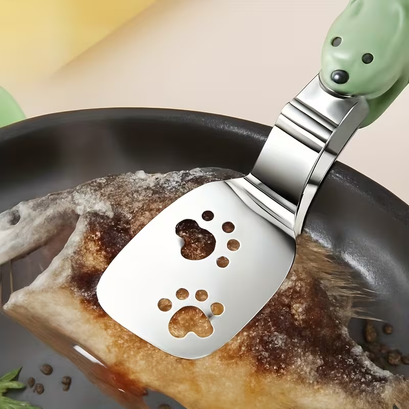 Stainless steel fish spatula, which can be used as both a tong and a spatula.