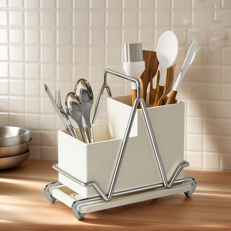 One cream-white stainless steel cutlery holder with metal trim.